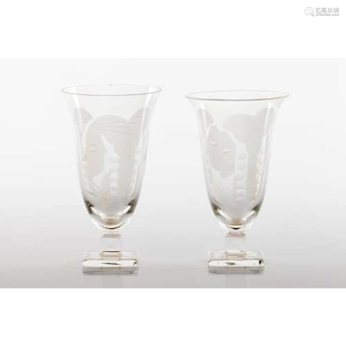 A pair of footed drinking glasses