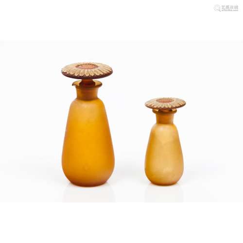 A pair of Art Nouveau bottles and stoppers