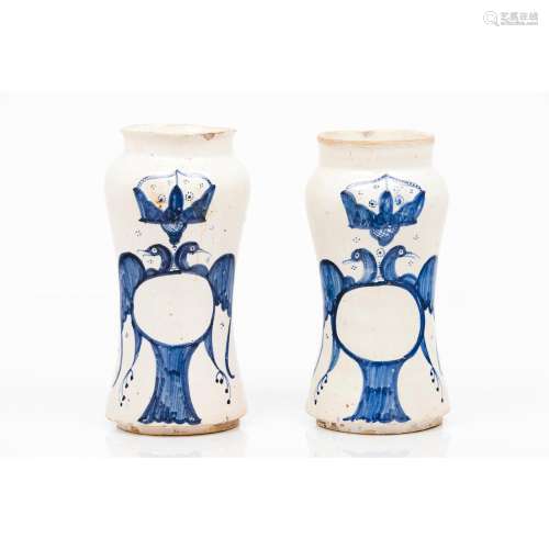 A pair of cylindrical vases