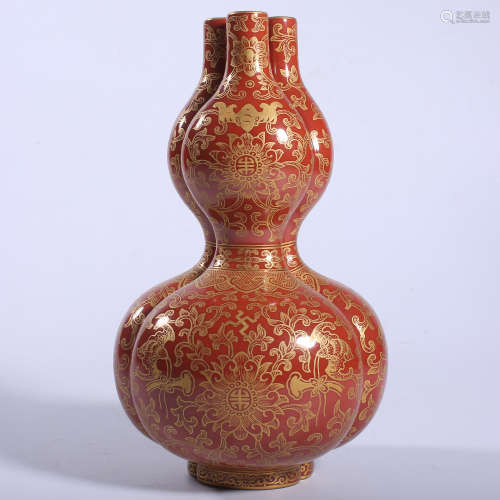 Three hole gourd bottle with red background and gold color i...