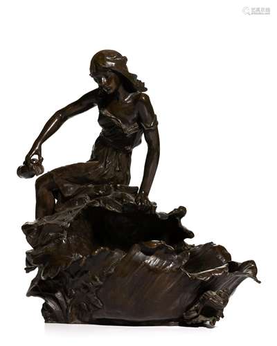 An Art Nouveau bronze sculptural basin