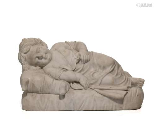 A French carved white marble reclining sleeping baby