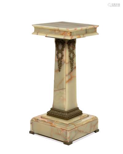 A gilt-bronze and onyx pedestal