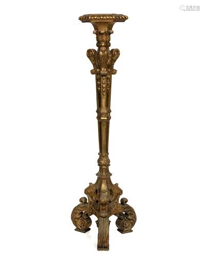 A carved giltwood pedestal stand