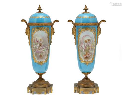 A pair of Sevres-style urns