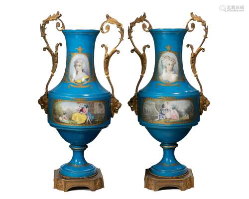 A pair of Sevres-style porcelain urns