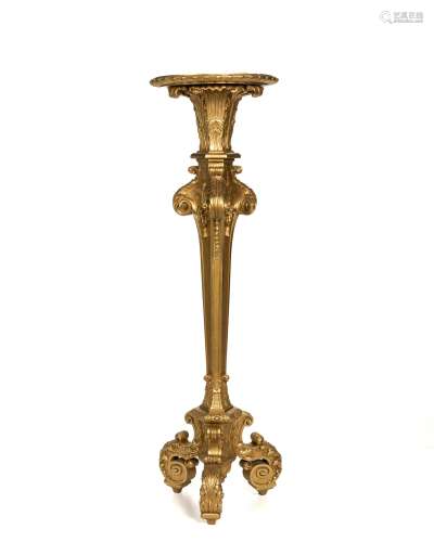 A carved giltwood pedestal stand
