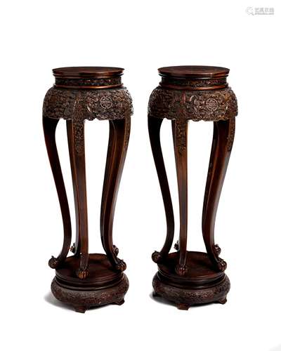 A pair of Chinese carved hardwood stands