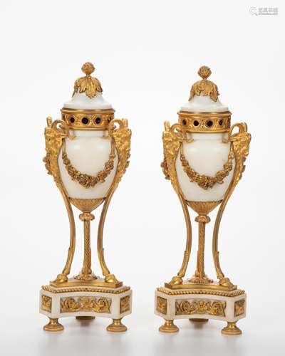 A pair of Louis XVI-style gilt-bronze and marble