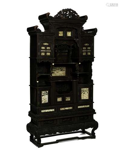 A Japanese carved hardwood cabinet on stand