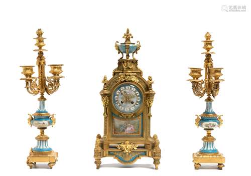 A gilt-bronze and porcelain mantel clock and garniture