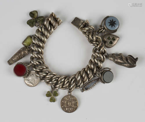 A decorated and plain multiple curblink charm bracelet, leng...