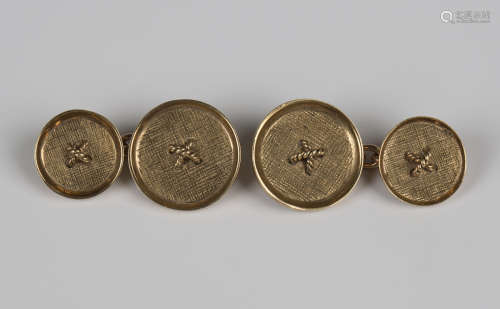 A pair of Kutchinsky 9ct gold cufflinks, designed as buttons...