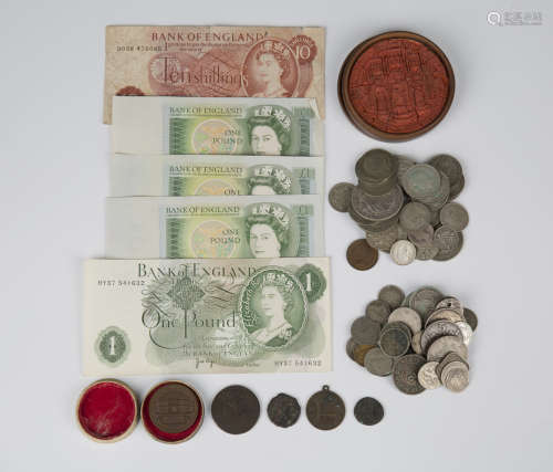 A small group of British pre-decimal coins, including a half...