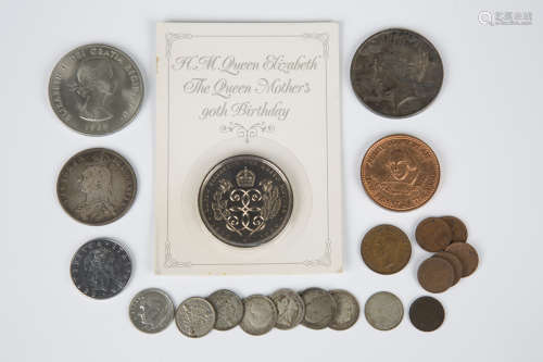 A small group of British and foreign coins, including a Vict...