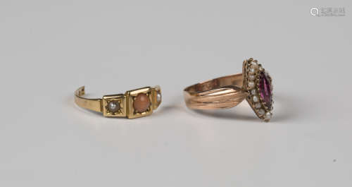 A Victorian gold, garnet and seed pearl marquise shaped clus...