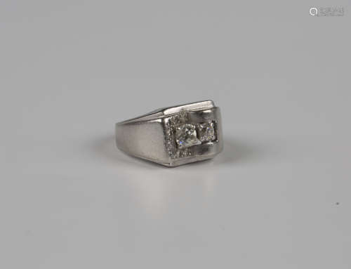 A diamond cocktail ring, mounted with two principal cushion ...