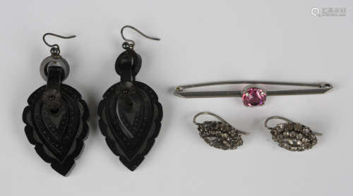 A pair of Victorian carved jet pendant earrings, each of dro...
