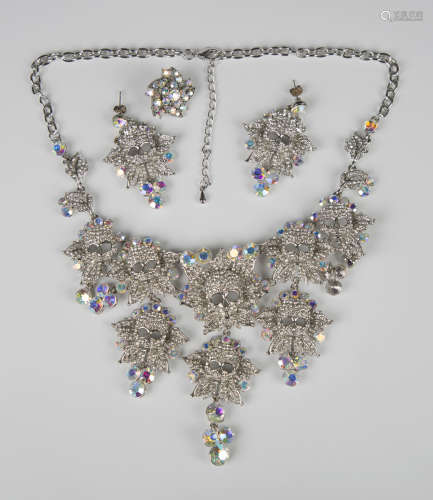 A Butler & Wilson style costume necklace, designed as skulls...