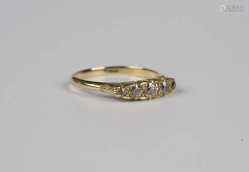A gold and diamond five stone ring, circa 1900, mounted with...