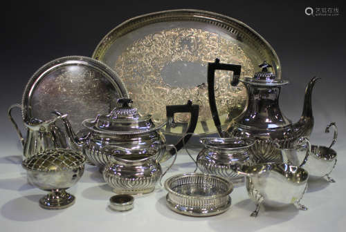A collection of plated items, including a four-piece tea set...