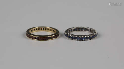 A white gold and sapphire full eternity ring, unmarked, weig...