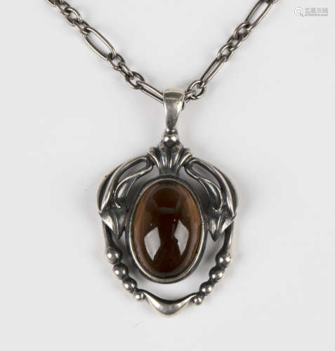 A Georg Jensen silver and smoky quartz pendant, circa 2014, ...