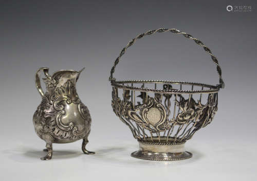 A 19th century Continental silver cream jug of baluster form...