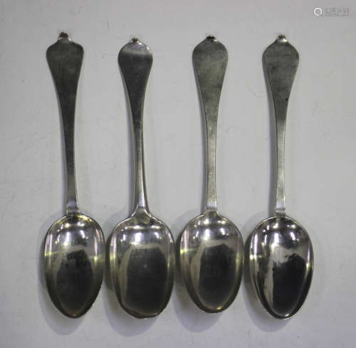A group of four 18th century Dutch silver dog nose spoons, e...