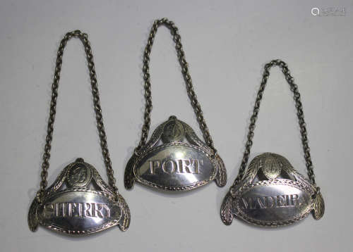 A George III Scottish silver 'Madeira' decanter label of ova...