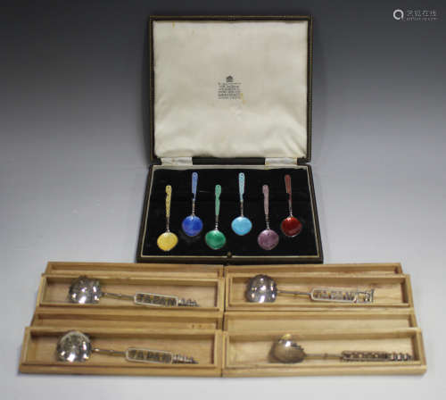 A set of six Elizabeth II silver and enamelled coffee spoons...