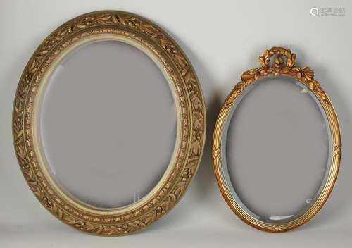 Two oval mirrors