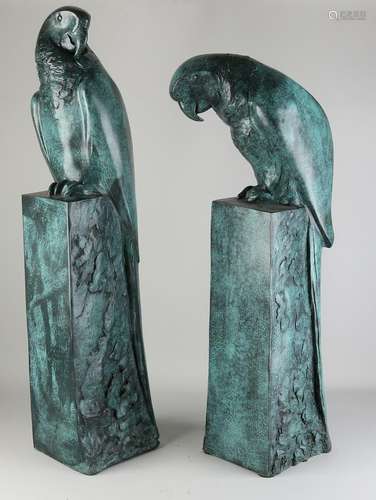 Two bronze parrots