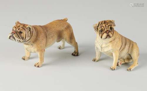 Two bronze dogs