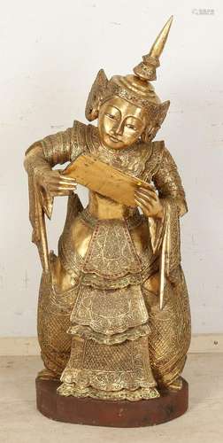 Carved oriental statue