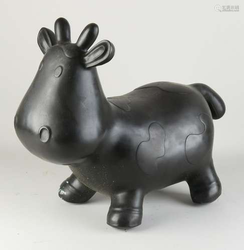 Modern bronze cow in cartoon style