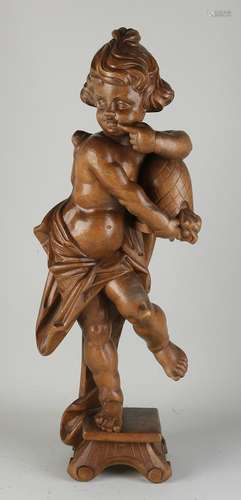 Wooden carved figure, Putti