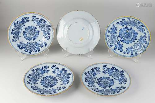 Five 18th century Delft plates Ã˜ 23 cm.