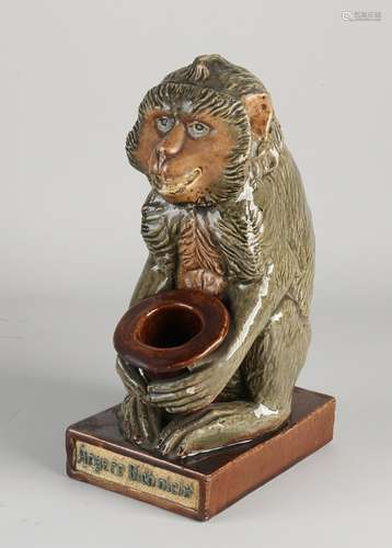 Majolica monkey with hat, 1900