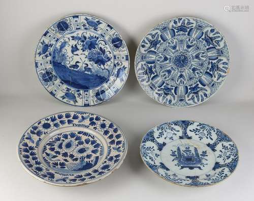 Four Delft decorative dishes Ã˜ 31 - Ã˜ 35 cm.