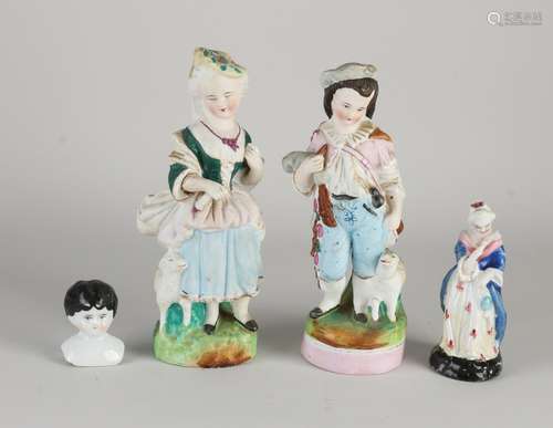 Four antique porcelain figures