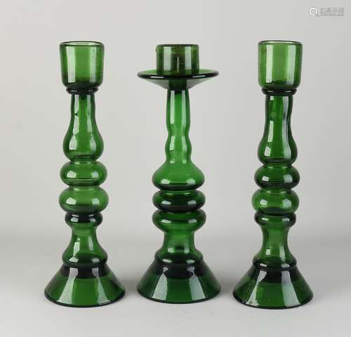 Three glass candlesticks