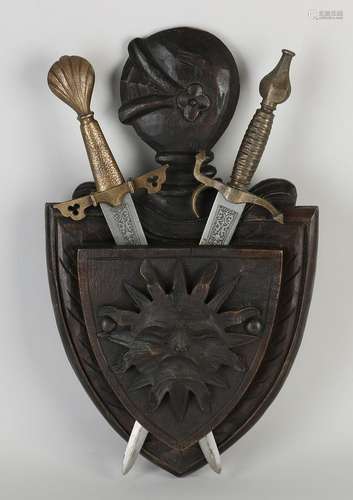 Coat of arms with two daggers