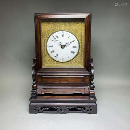 A TABLE CLOCK WITH STAND
