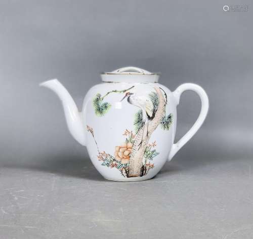 A FAMILLE ROSE 'CRANE AND PINE' TEAPOT