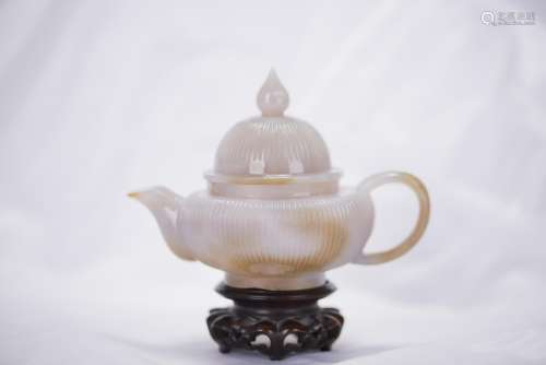 AN AGATE TEAPOT WITH STAND