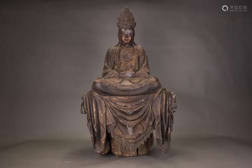 A GILT-LACQUERED WOOD FIGURE OF BUDDHA