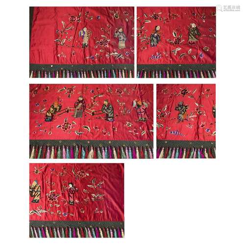 A CHINESE RED-GROUND EMBROIDERED SILK OF FIGURE