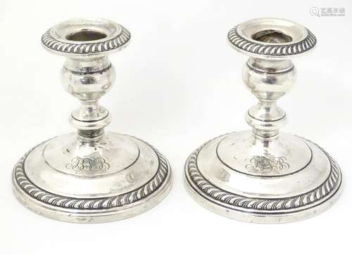 A pair of American sterling silver candlesticks by