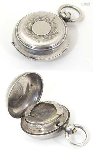 A silver sovereign case, hallmarked Birmingham 1905,